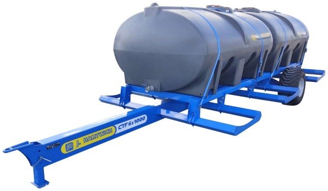 Sistema de riego para carro transporte de fardos